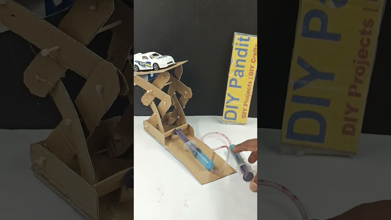 Figure 2: Working Model Setup, Scientific Diagram & Project Prototype for Scissor Lift Working Model Using Ice Cream Sticks